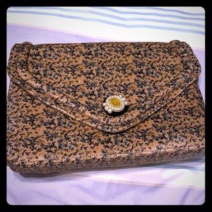 Anthropologie clutch with optional pearl strap
